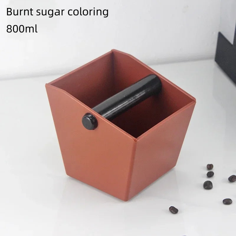 Anti slip coffee knock box in burnt sugar color with a sturdy handle for easy use