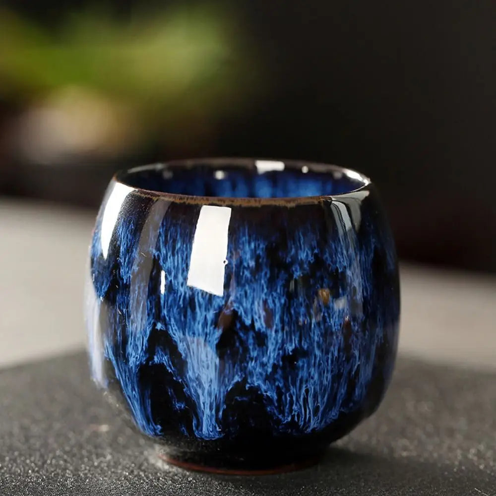 Handcrafted Japanese ceramic espresso cup with a glossy blue finish ideal for enjoying espresso