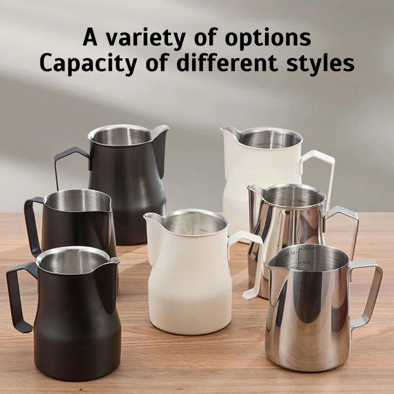 Assorted professional barista milk pitchers in various styles and colors for coffee enthusiasts