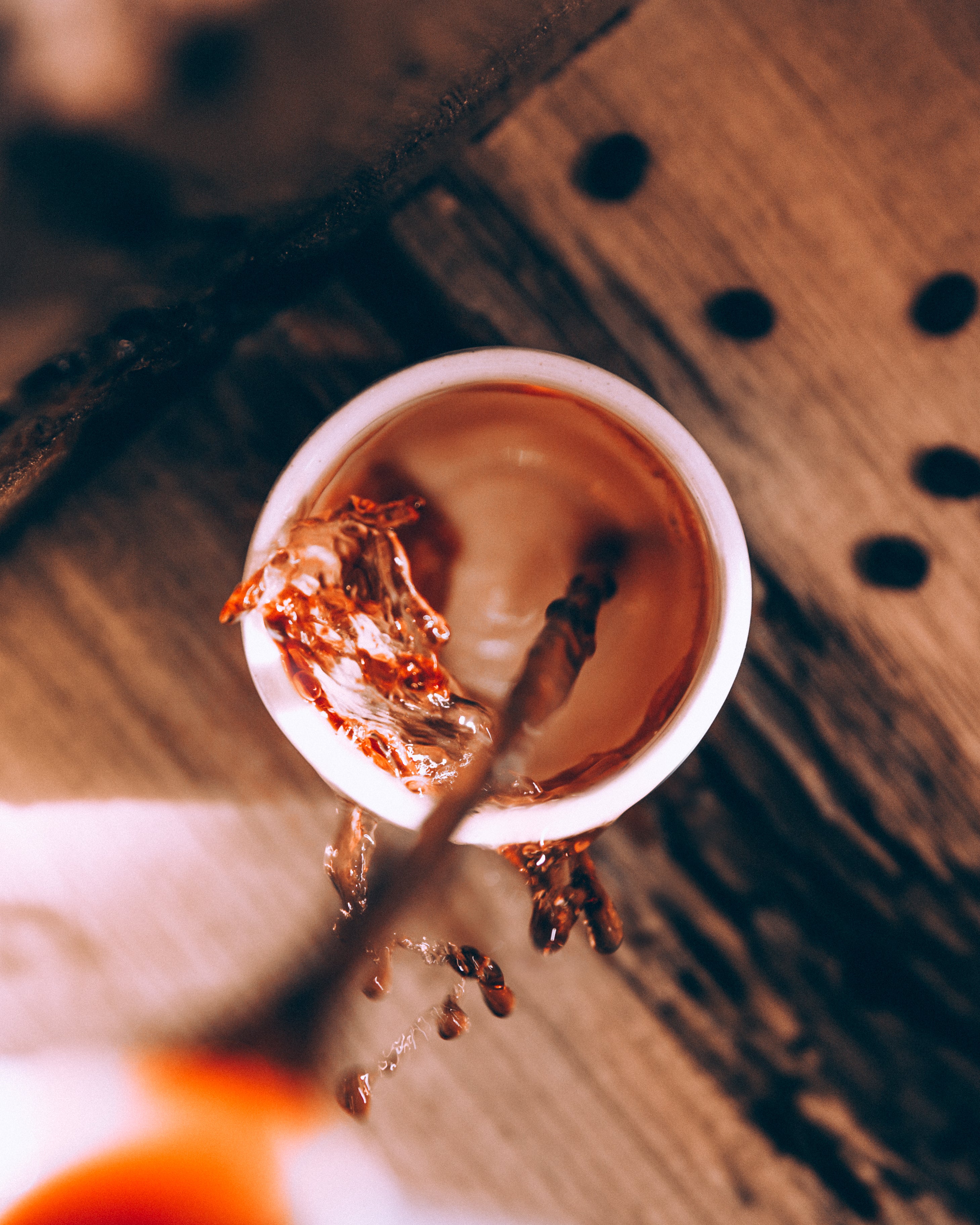 pouring into a mug of specialty coffee