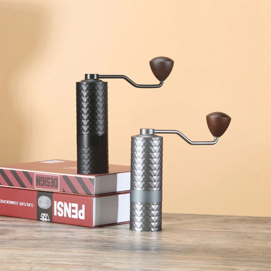 Adjustable burr coffee grinder in black and silver design, perfect for fresh coffee grounds.