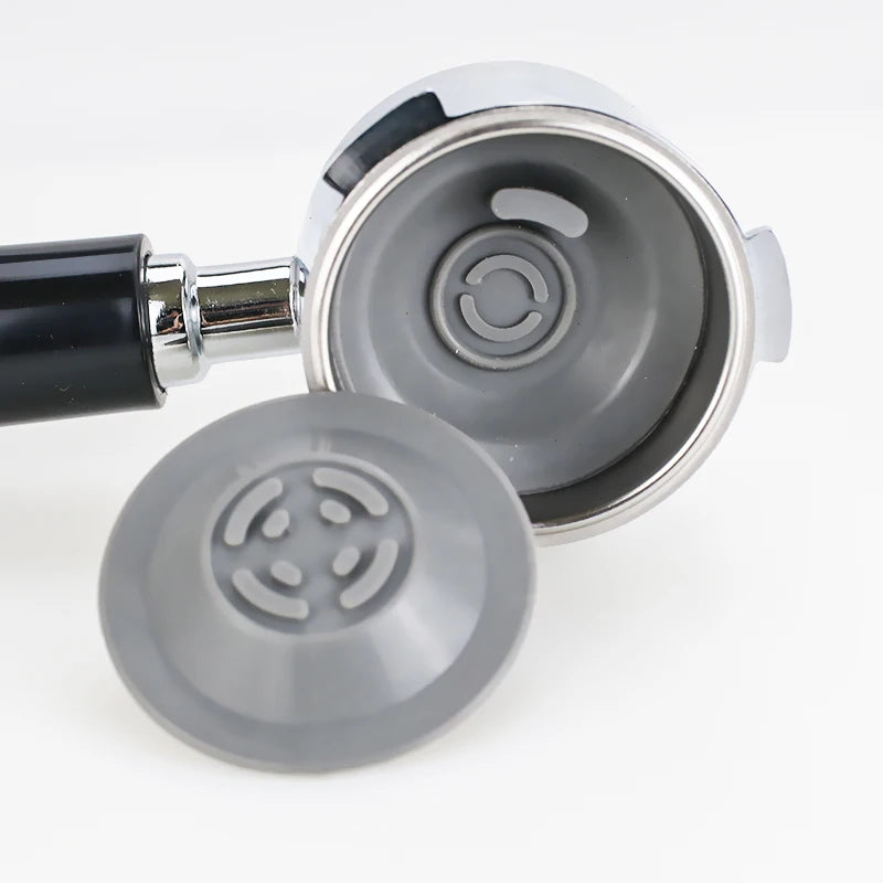 Backflush portafilter disc in gray, compatible with 58mm portafilters for effective cleaning