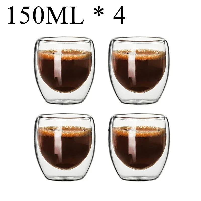 Set of four 150ml double wall glass coffee mugs filled with espresso coffee