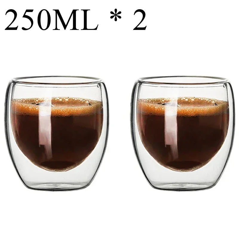 Set of two 250ml double wall glass coffee mugs filled with espresso from UK Espresso