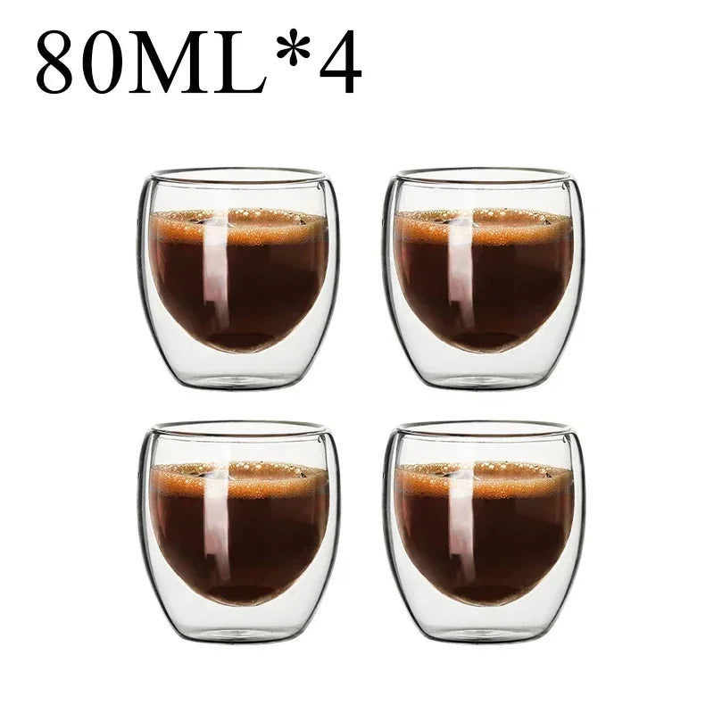 Set of four 80ml double wall glass coffee mugs filled with espresso from UK Espresso
