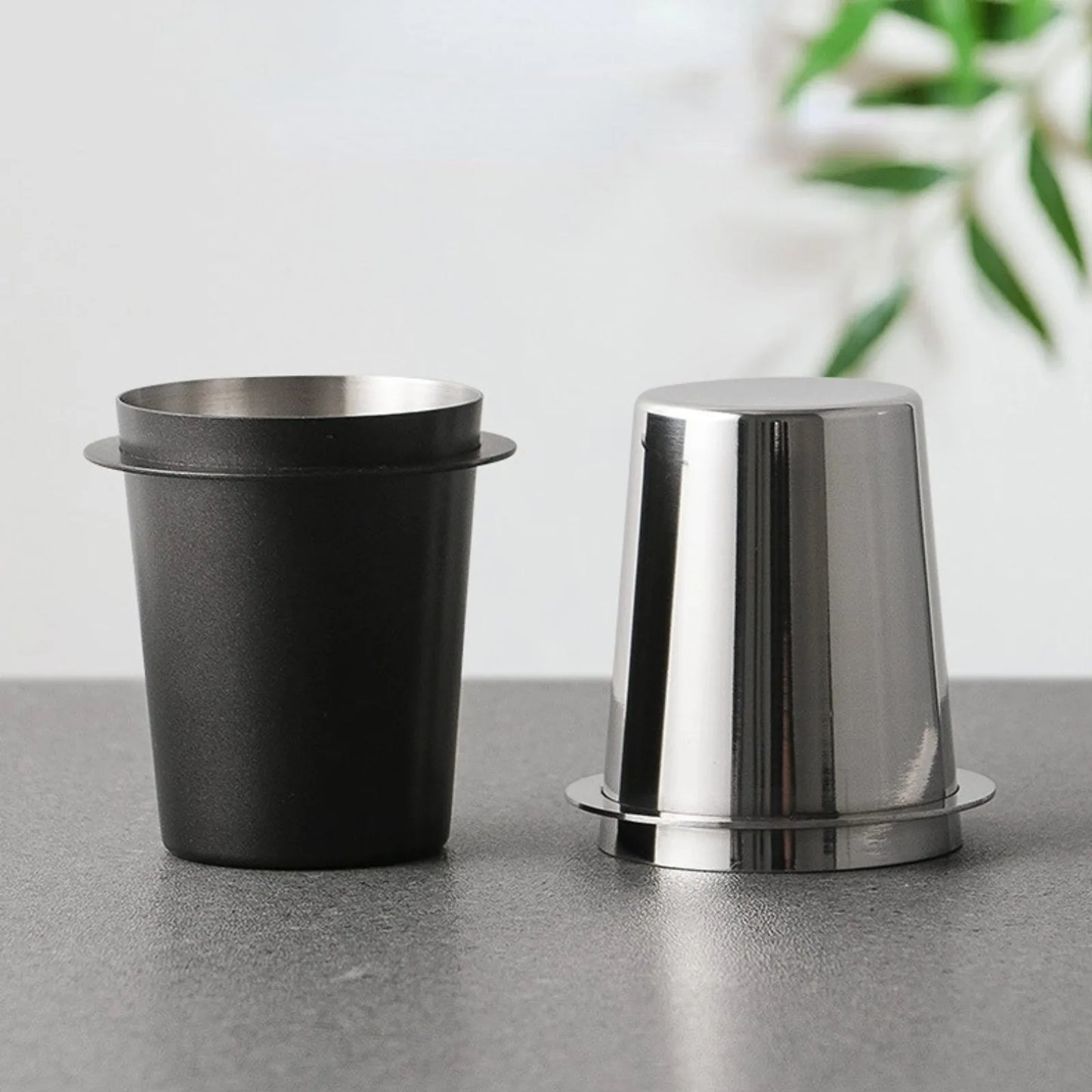 UK Espresso espresso dosing cup in black and stainless steel, compatible with 58mm portafilters
