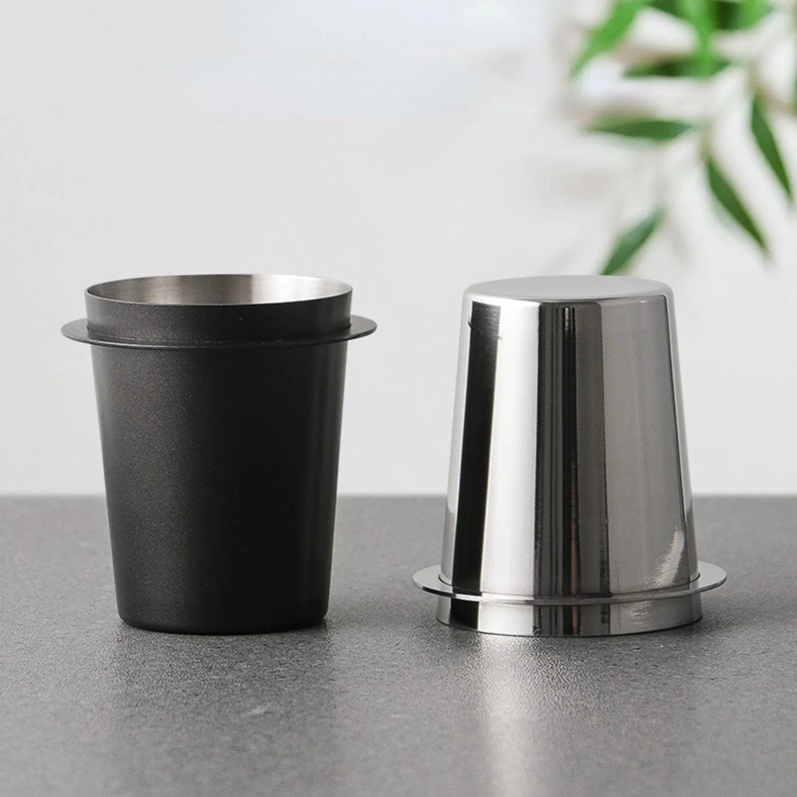 UK Espresso espresso dosing cup in black and stainless steel, compatible with 58mm portafilters