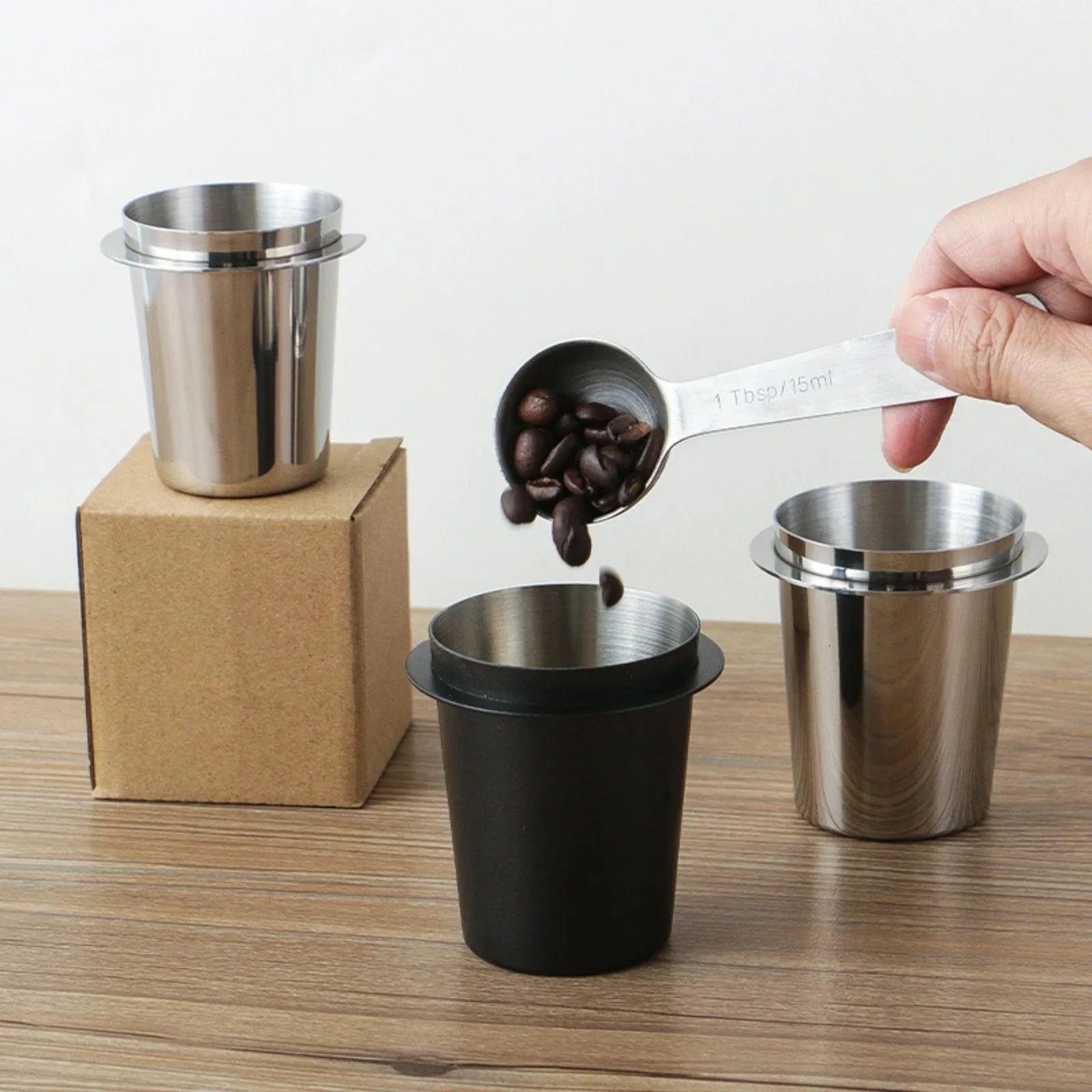 UK Espresso espresso dosing cup in stainless steel and black, perfect for precise coffee measurement