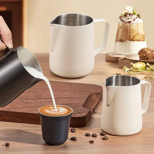 UK Espresso professional barista milk pitcher set in black and white for creating latte art