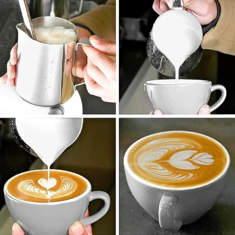Stainless steel milk frothing jug being used to create latte art in a cup